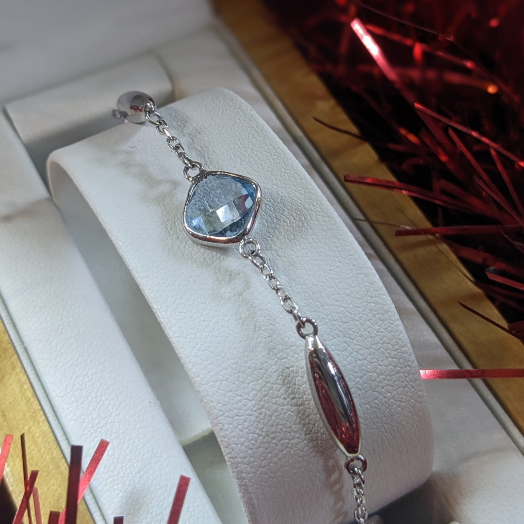 Blue Topaz Cushion Bracelet in 9ct white gold, Design Centre Jewellery. Jewellery Quarter Birmingham. 